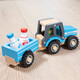 New Classic Toys. Трактор с прицепом и молоком (11942)